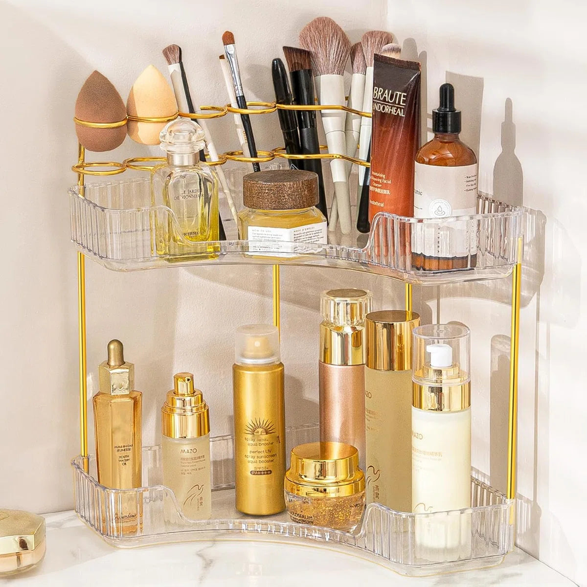 منظم مكياج وعطور فاخر بطبقتين – تصميم شفاف بإطار ذهبي أنيق