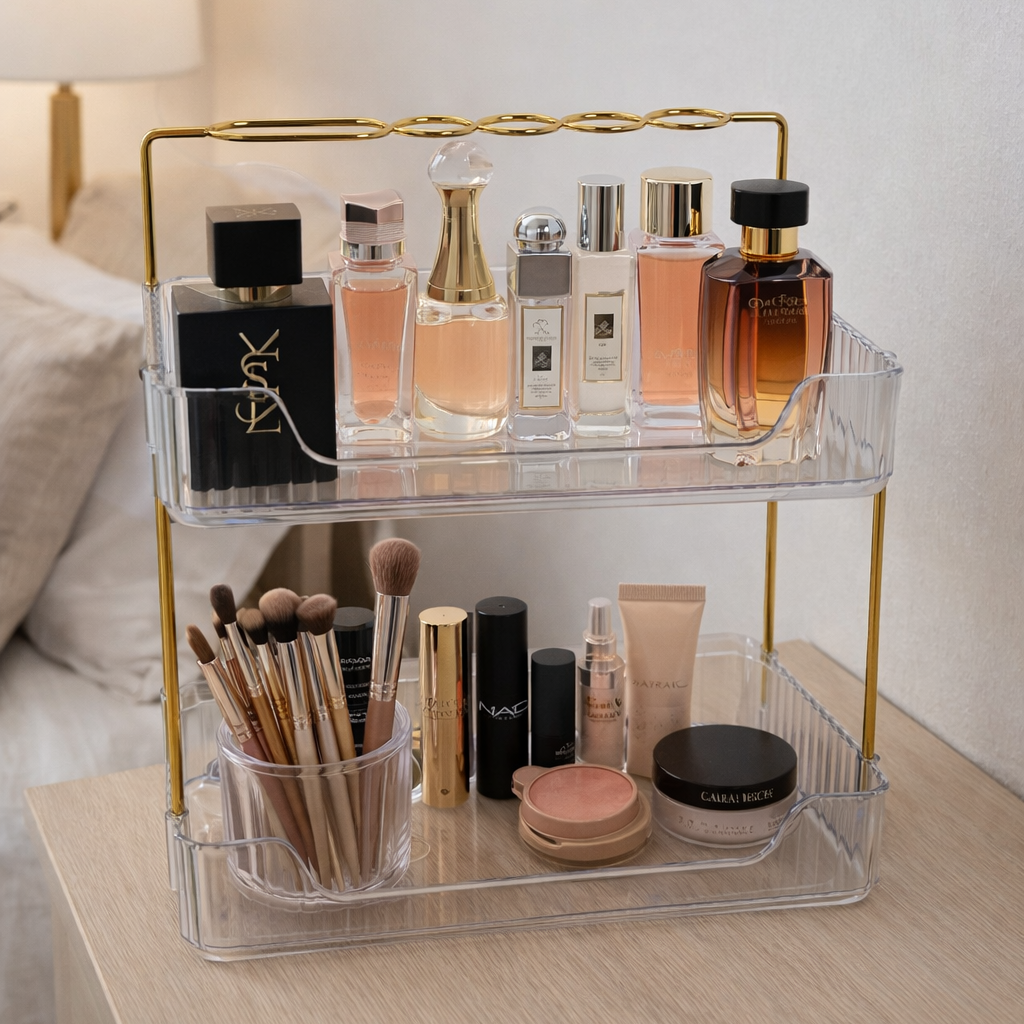 منظم مكياج وعطور فاخر بطبقتين – تصميم شفاف بإطار ذهبي أنيق
